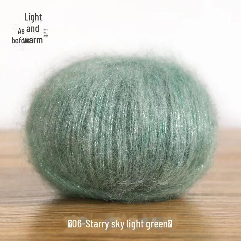 

Светр-шарф ручної в язки з блискучим мохером