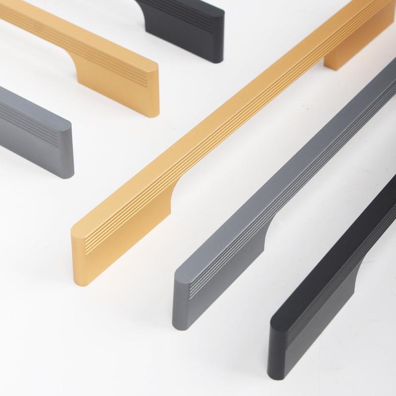 Bardzo długi prążkowany uchwyt typu pocisk do szafek i szaf