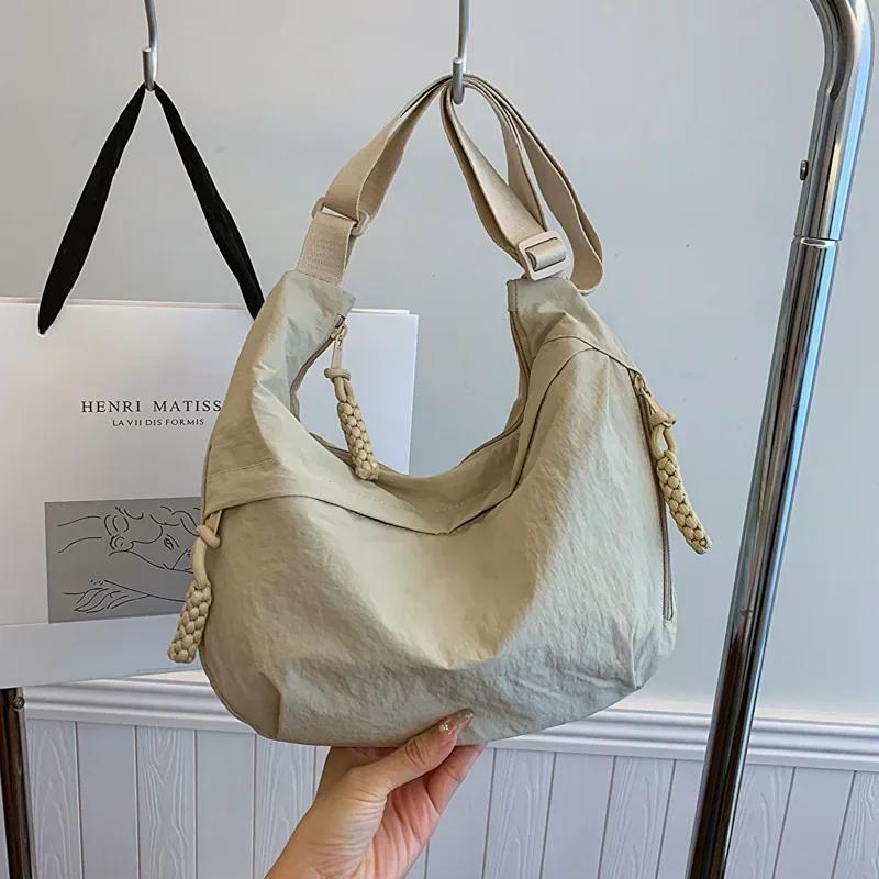 

Fashiable and minimalist Korean versi dumpling bag, popular this year, new high-quality shoulder bag, large capacity tote cr бежевый