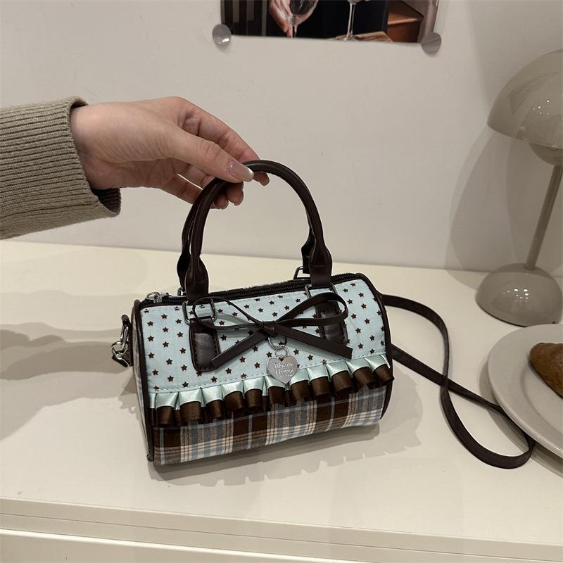 

Girly style pleated bow single shoulder messenger bag niche design sense summer fashion portable pleated dumpling bag tide