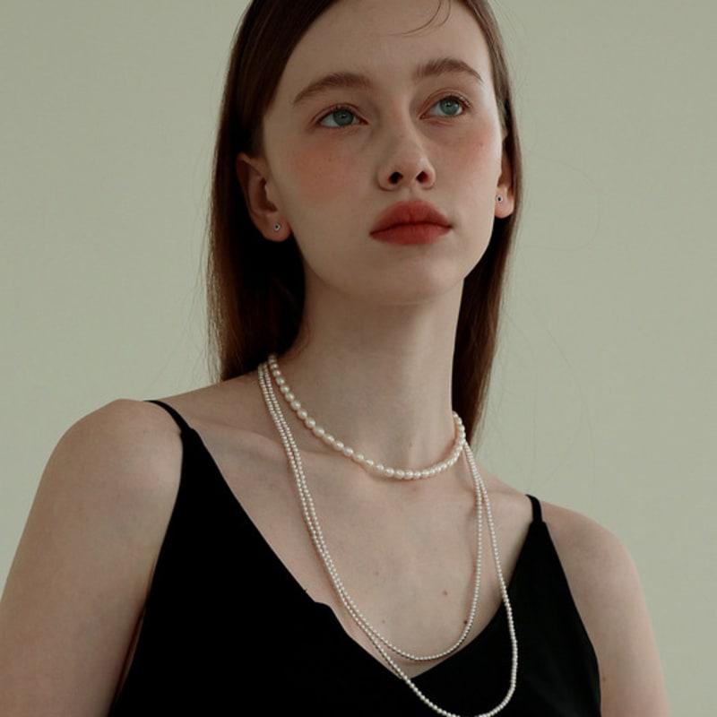 Less is more long pearl necklace