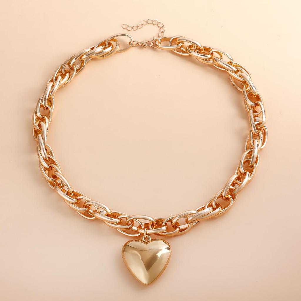 Chunky O-Chain Heart Pendant Necklace: European & American Cool Style with Exaggerated Hollow Peach Heart Design