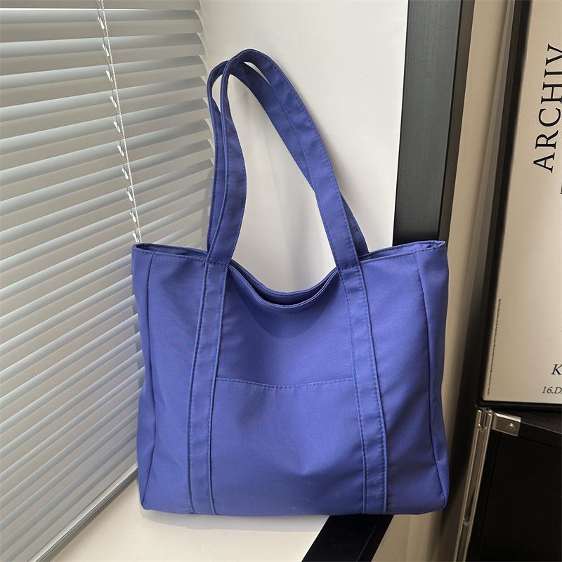 

Модна полотняна сумка великої місткості 2024 весна популярна нова сумка через плече студентська сумка Інтернет знаменитості проста жіноча сумка