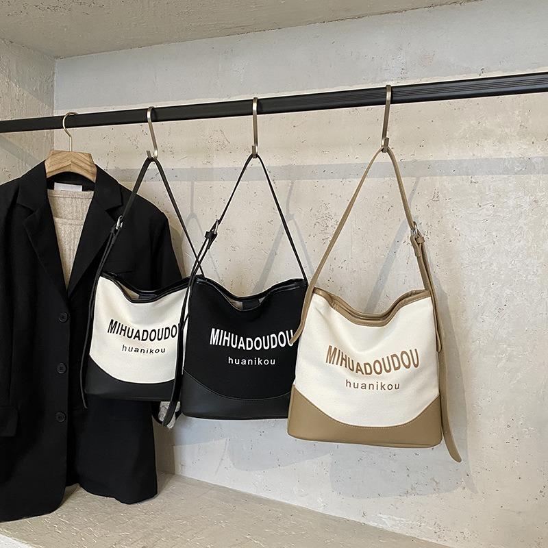 Casual Commuting Large-capacity Bag Women's New Popular Versatile Canvas Shoulder Bag Crossbody Bucket Bag