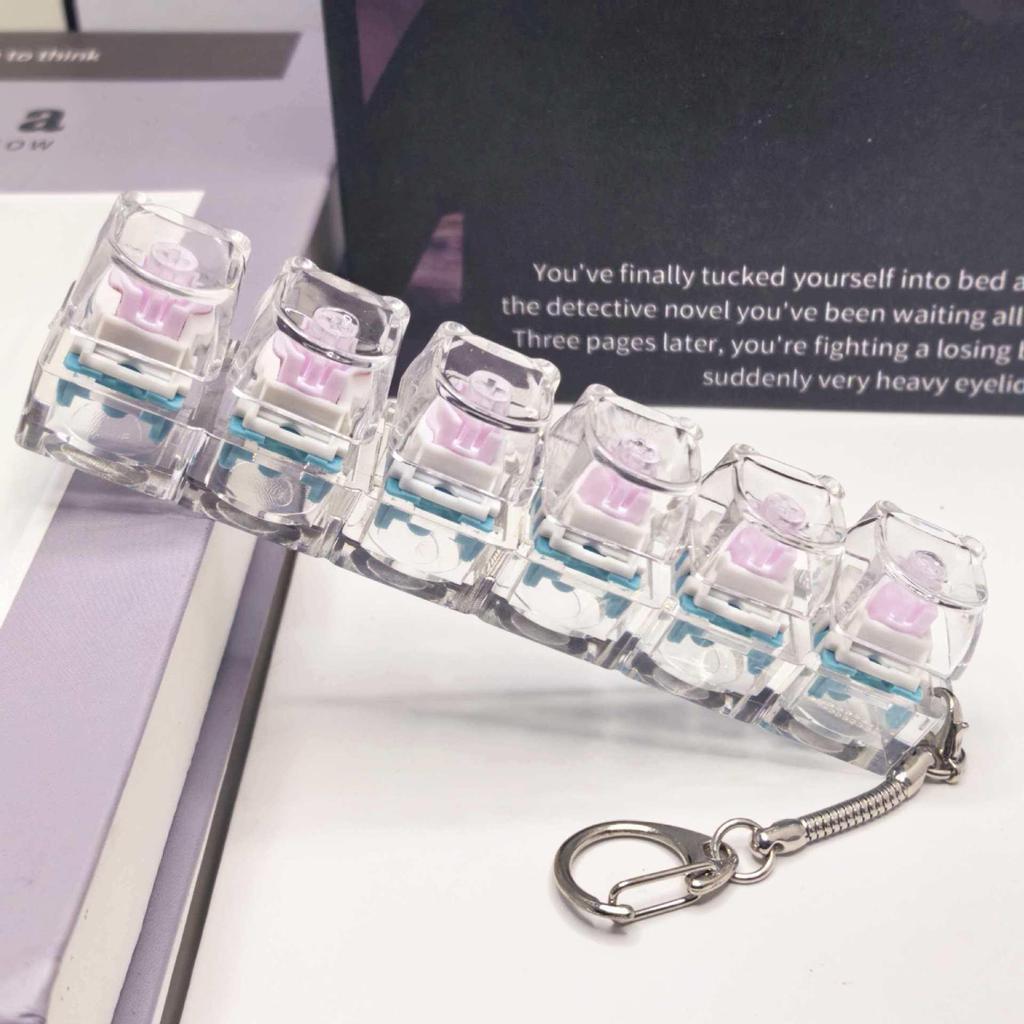 Stummer mechanischer Tastatur-Schlüsselanhänger mit 5,6 Kreuzachsen-Tasten und hochtransparenten Tastenkappen; Dekompression Spielzeug.