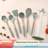 7-Piece Silicone Kitchenware Set with Wooden Handles, Non-Stick Spatula, Soup Ladle, and Rotating Storage Rack.