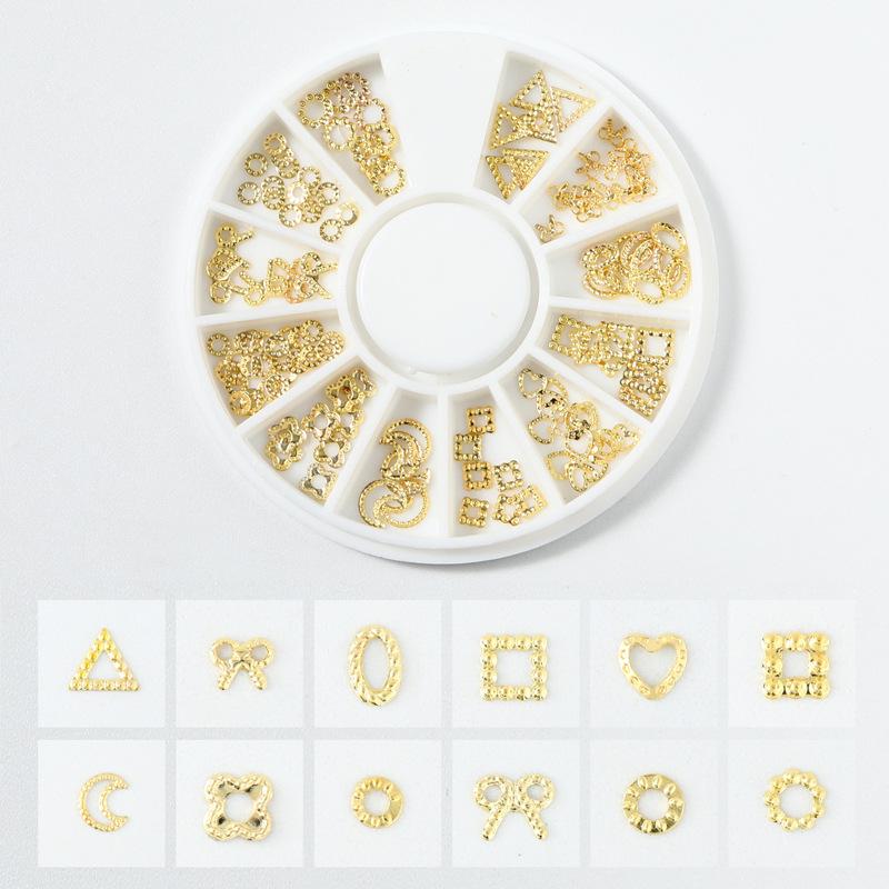 Goldener Schmuck Stern und Mond Nietendesign Wasseraufkleber Nagelsticker Nagelkunst Dekoration Hohle Legierung Nageldekoration