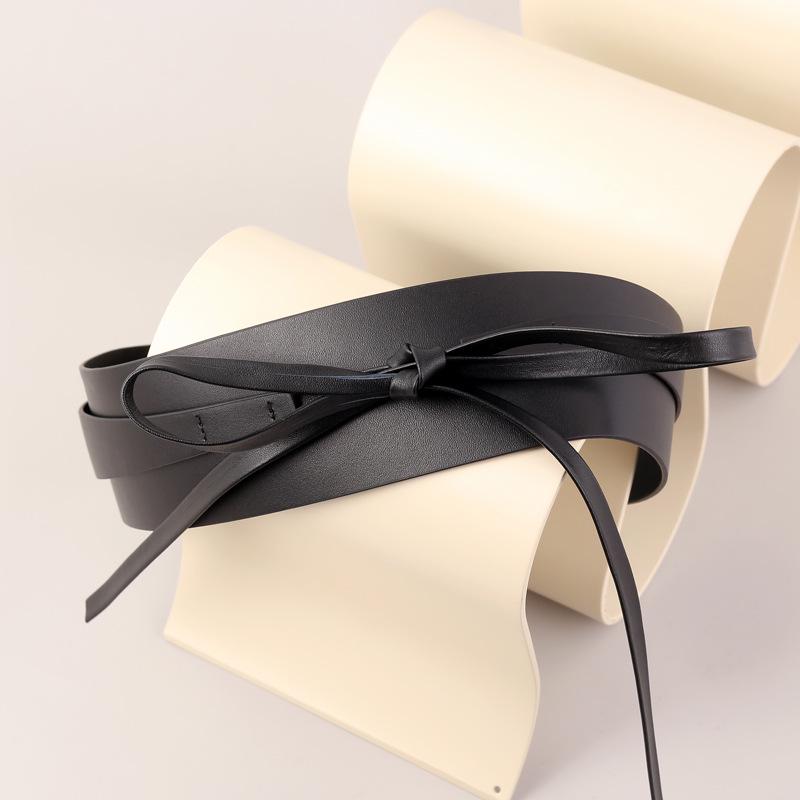 

Элегантный женский широкий кожаный ремень в корейском стиле с нишевым дизайном 125cm чёрный