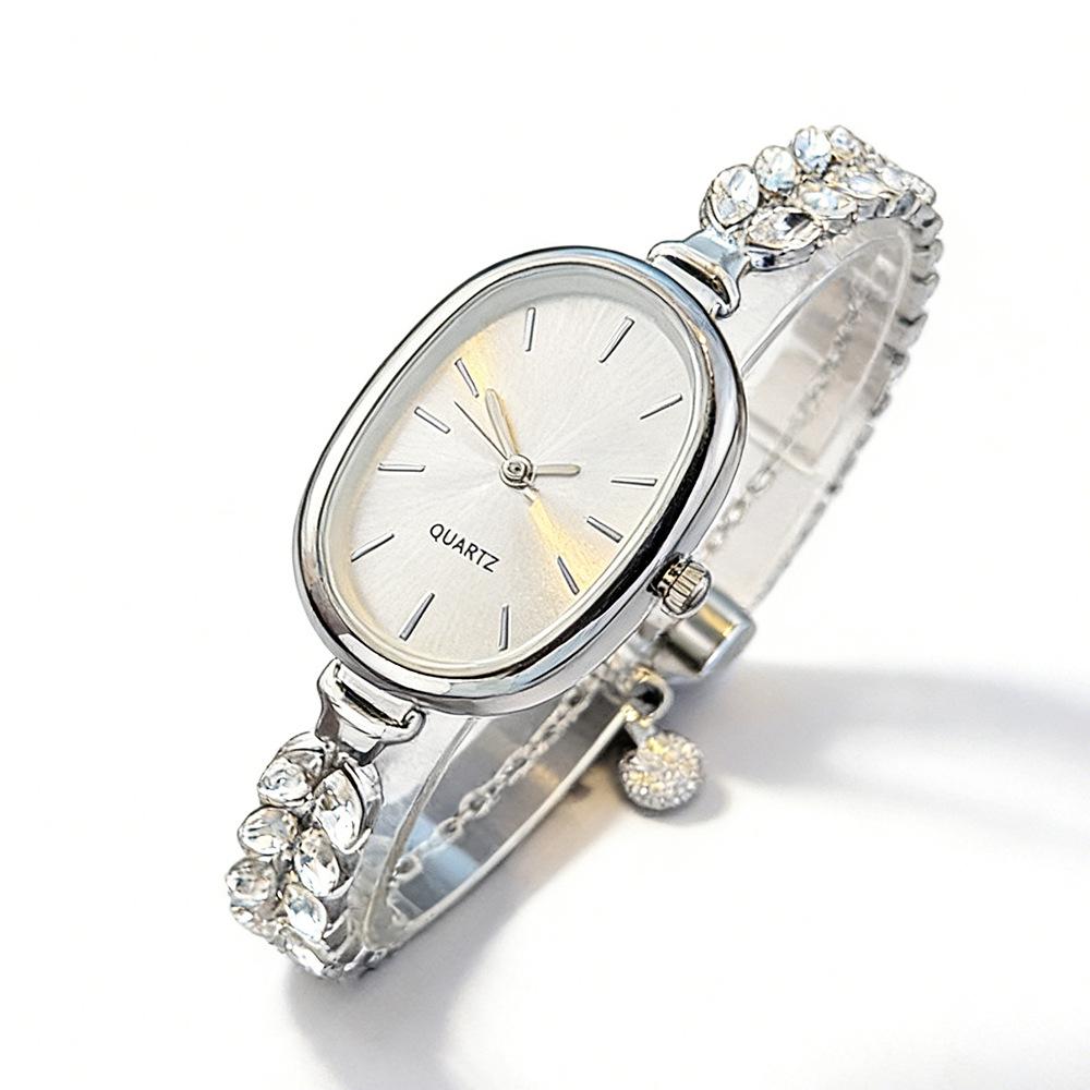 Elegante Damen-Gold-Diamant-Armbanduhr - Ovales Zifferblatt Quarz-Armbanduhr