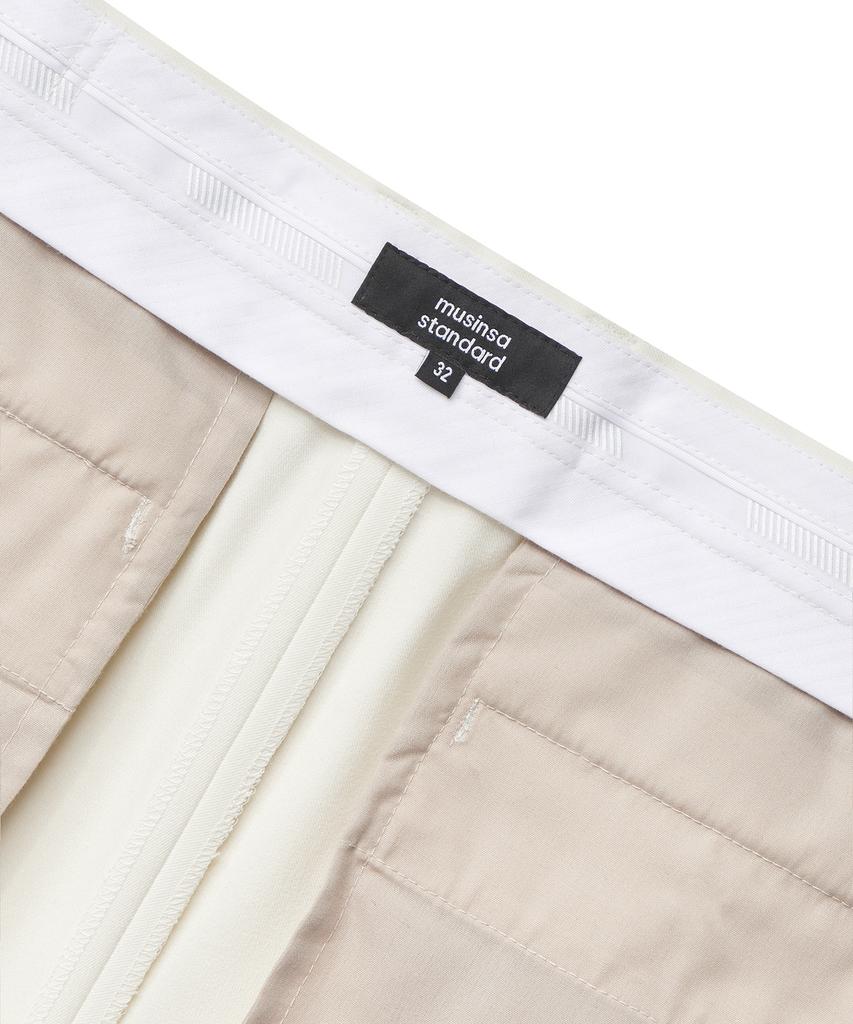 MUSINSA STANDARD Tapered Hidden Elastic Waist Length Slacks [Cream]