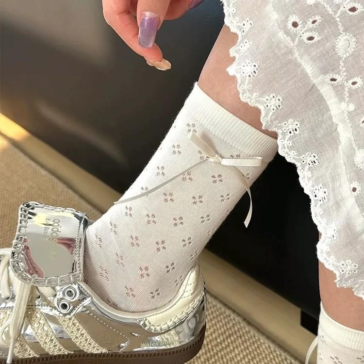 Thin Cream Mesh Stacked Socks With Bow Streamers On The Side And Carved Out Hollow Tube Socks Lolita
