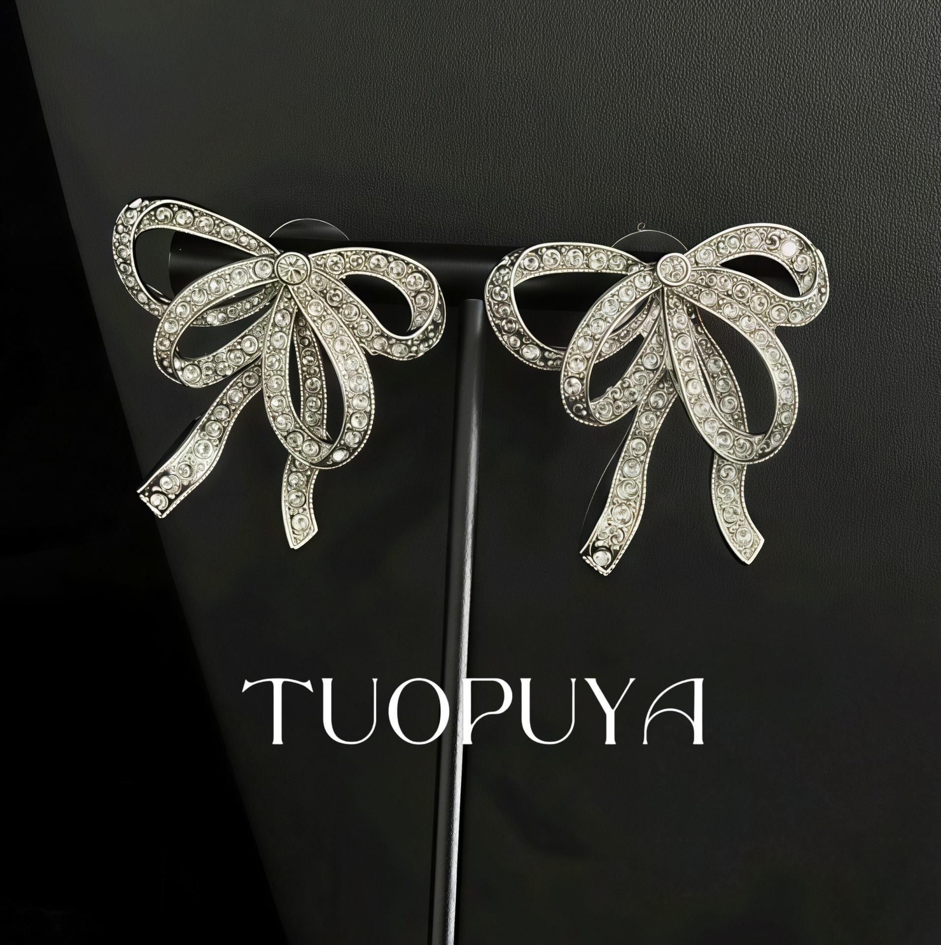 Elegant Rhinestone Bow Earrings - Versatile Silver Studs, Celebrity Style.