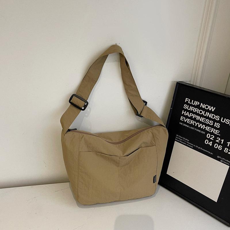 Japanese casual niche design crossbody bag one-shoulder summer cloth bag women's 2025 simple retro commuter tote bag