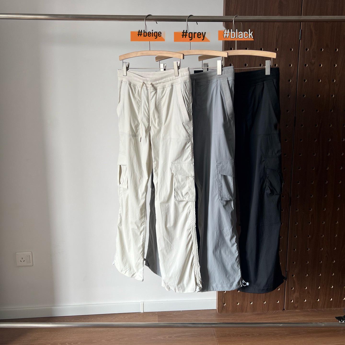 

Fashionable Unisex Slimming Elastic Waist Cargo Pants with Drawstring and Multi-Pocket Design S кремовый