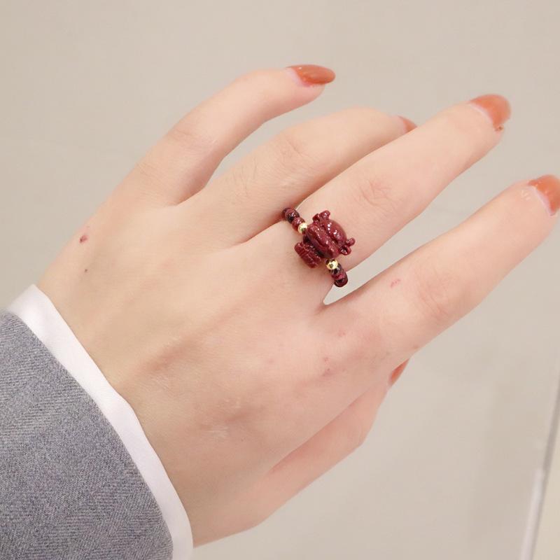 

Cinnabar natural garnet purple gold sand ring female zodiac cow ring natal year engraved bead flower index finger ring
