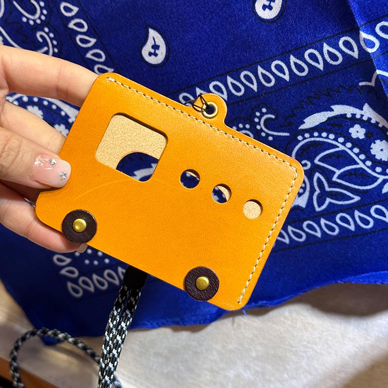 

Handmade leather goods Cowhide car badge bus card cover Convenient personality Small leather goods Versatile light luxury neck hanging creativity помаранчевий