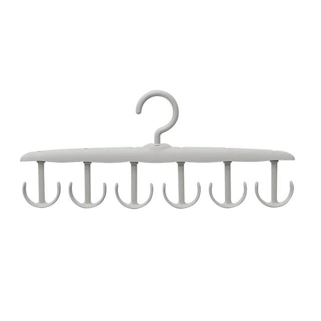 Multifunktionale Kleiderbügelständer unterstützen das kreisförmige Trocknen von Schals und Socken aus Kunststoff und sind Aufbewahrungsregale für Krawattengürtel und BHs