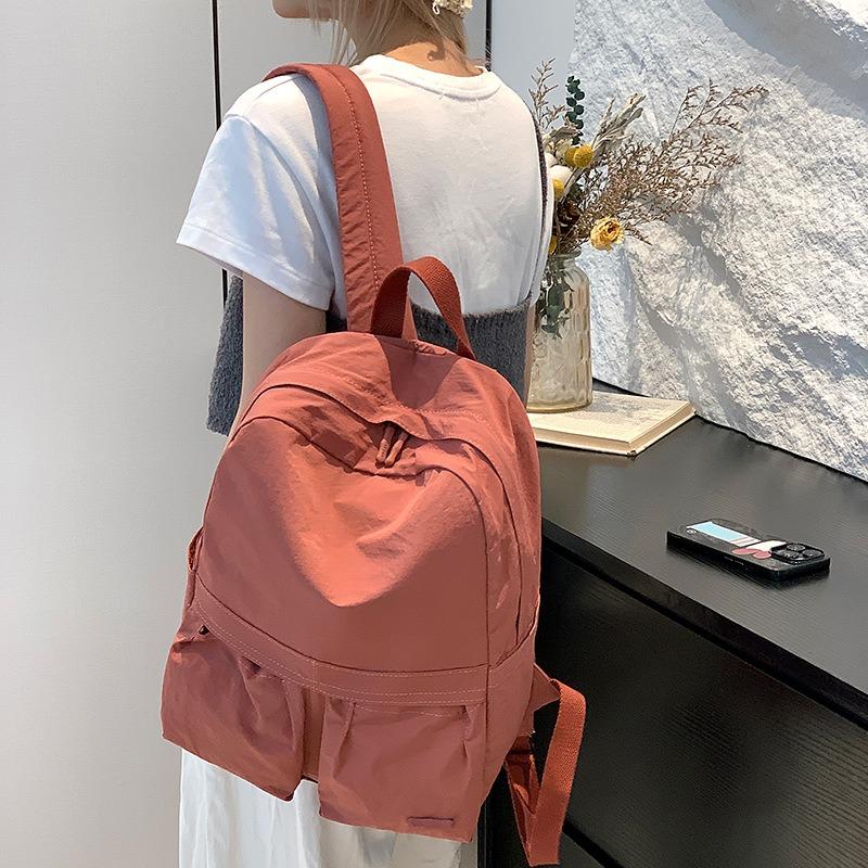 Simple and fashionable student backpack versatile large capacity lightweight and comfortable women's bag anti-splashing nylon bag