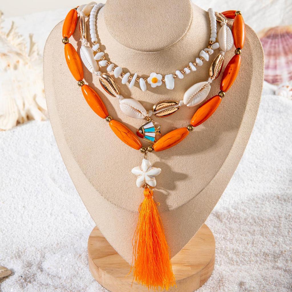 Sommer Neuer Strandurlaubsstil Ei Blume Muschel Seestern Anhänger Quaste Halskette Damen Schmuck Böhmischer Stil Anhänger Dreiteiliges Set Halskette