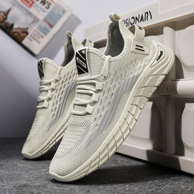 Wiosenne nowe buty męskie oddychające siateczkowe tkane na muchę buty codzienne wszechstronne buty sportowe do biegania modne buty kokosowe