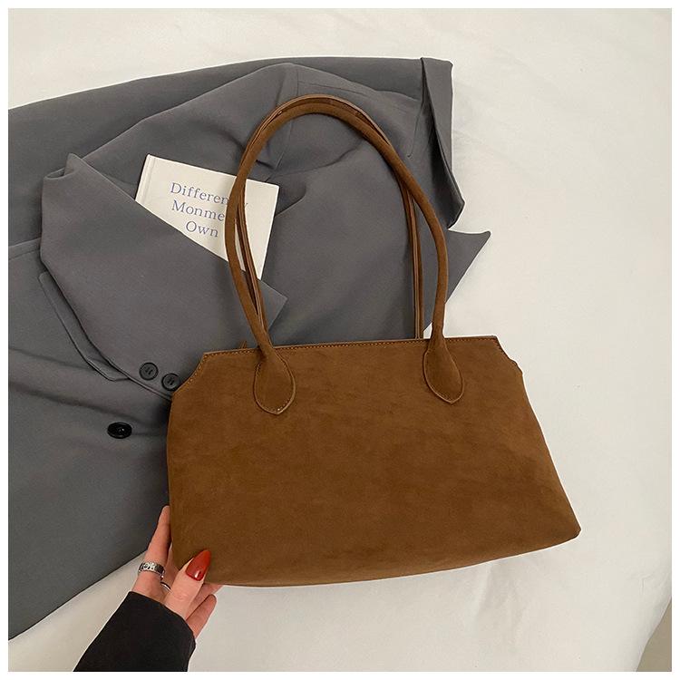 

2025 summer new tote bag minimalist fashion satchel large capacity niche design daily commute armpit bag