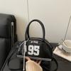 Bag women's new bowling bag fashionable oily leather splicing contrasting color digital decoration portable women's handbag