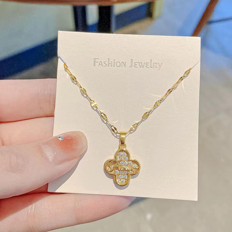 High-End Titanium Steel Clavicle Chain with Zircon Inlaid Four-Leaf Clover Pendant Necklace