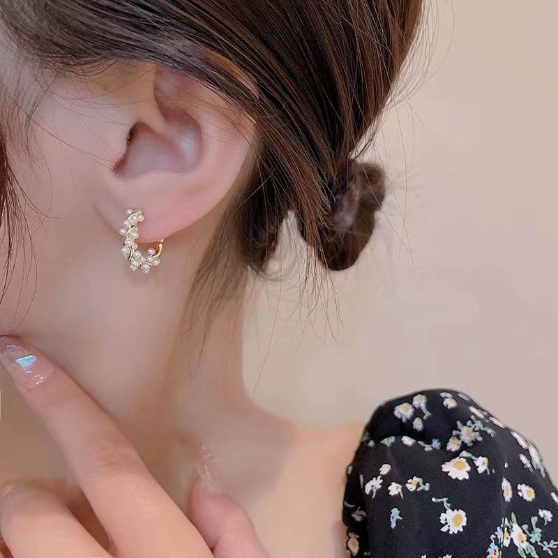 A Minimalist and Elegant Round Pearl Earring Suitable for Women. Fashionable Small Earrings and Jewelry