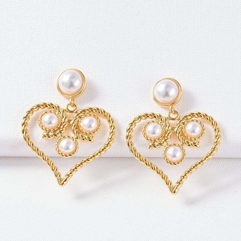 

Французские ретро серьги с полыми жемчужинами и любовным темпераментом, игла из серебра 925 пробы, серьги с преувеличенной индивидуальностью золотой