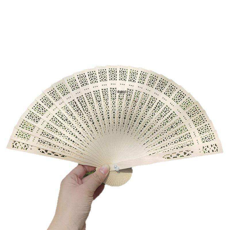 

Chinese Sandalwood Folding Fan: Hollow Design for Weddings, Photography, Qipao, Dance & Gifts