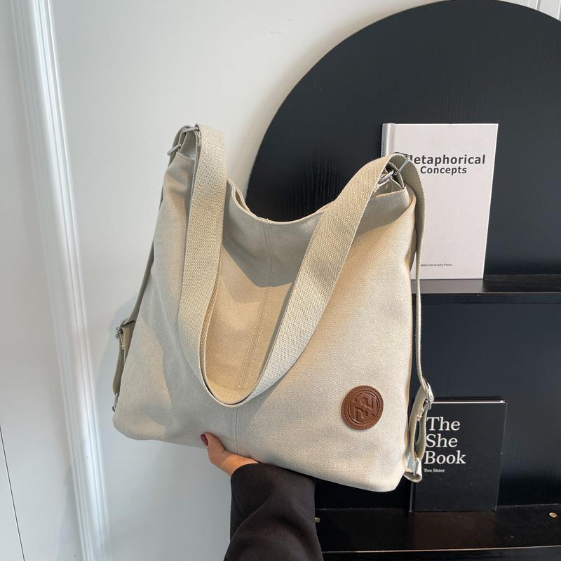 Canvas tote bag women's 2025 new fashionable large-capacity shoulder bag versatile student class backpack