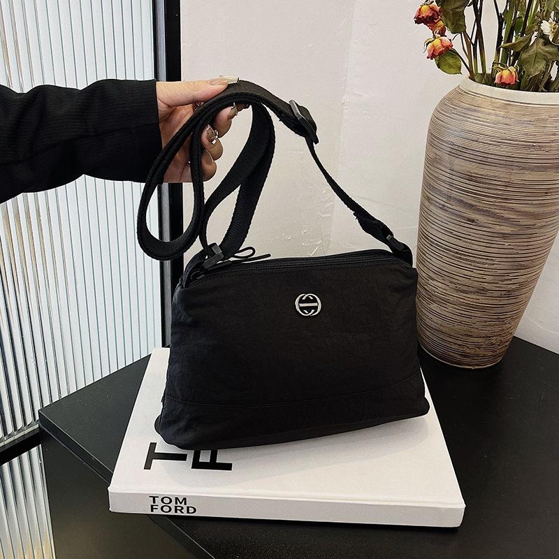 Korean version of simple trend multi-layer nylon women's bag casual fashion versatile shoulder messenger bag large capacity dumpling bag