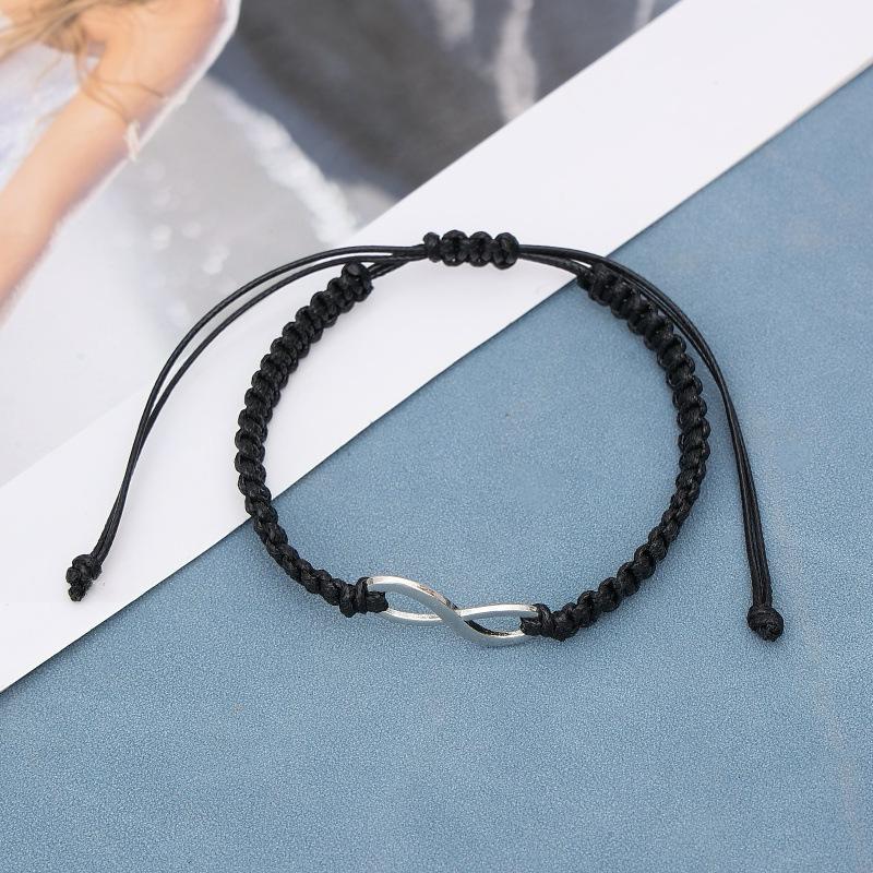 

Винтажный браслет с регулируемым подвесом в виде двойного кольца - Черно-белый плетеный шнур 2025