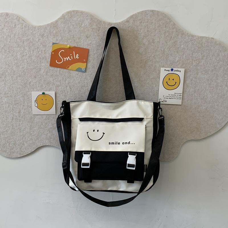 Student large-capacity stationery bag, portable storage bag, new handbag, shoulder bag, messenger bag.