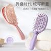The new fluffy high cranial top comb comes with its own clean and removable massage airbag air cushion comb folding ribs comb.