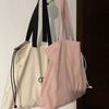 College students commute to class shoulder bag 2024 new large-capacity lazy style versatile tote bag drawstring armpit bag