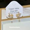 Ear clips without ear holes~ Camellia pearl stud earrings high-end sense niche gentle and sweet earrings women's mosquito coil disc earrings