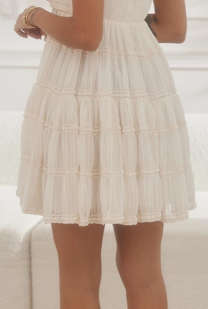 Rumi - airy mini dress in sand tone