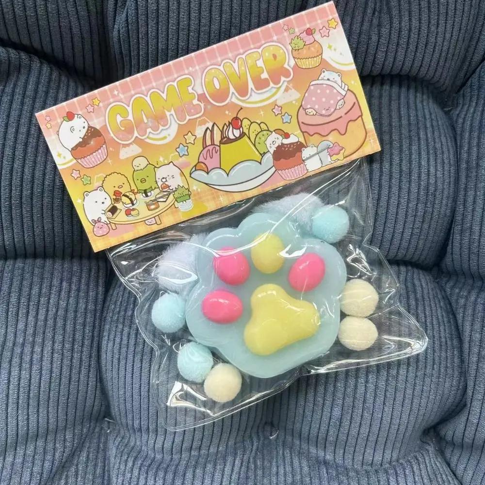 2 Giocattoli Squishy A Forma Di Zampa Di Gatto – Palline Antistress In TPR Morbide E Resistenti Per Ansia E Relax, Colori Blu E Multicolore (7x6,5 Cm)