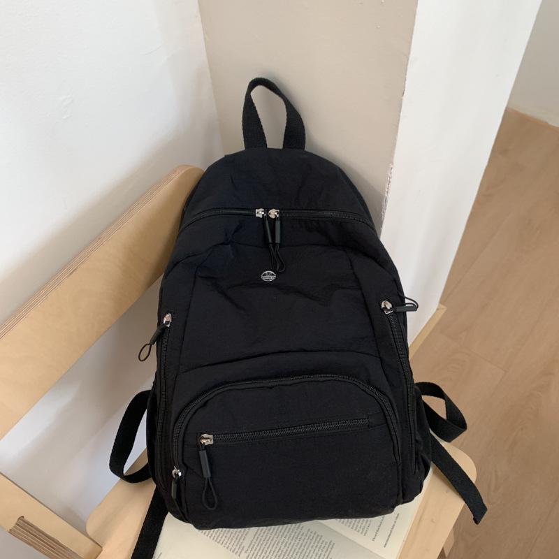 

Універсальний нейлоновий рюкзак: Просторі, Стильні та Легкі для Жіночого Осінньо-Зимового Сезону 2025 чорний