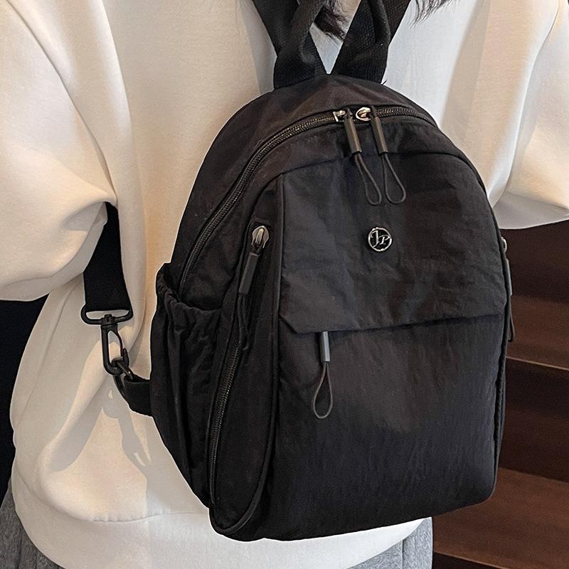 Schoolbag Large Capacity Backpack Women's 1011 Spring New Lightweight Cloth Simple Travel Bag Women's Trend Leisure Bag Small Backpack