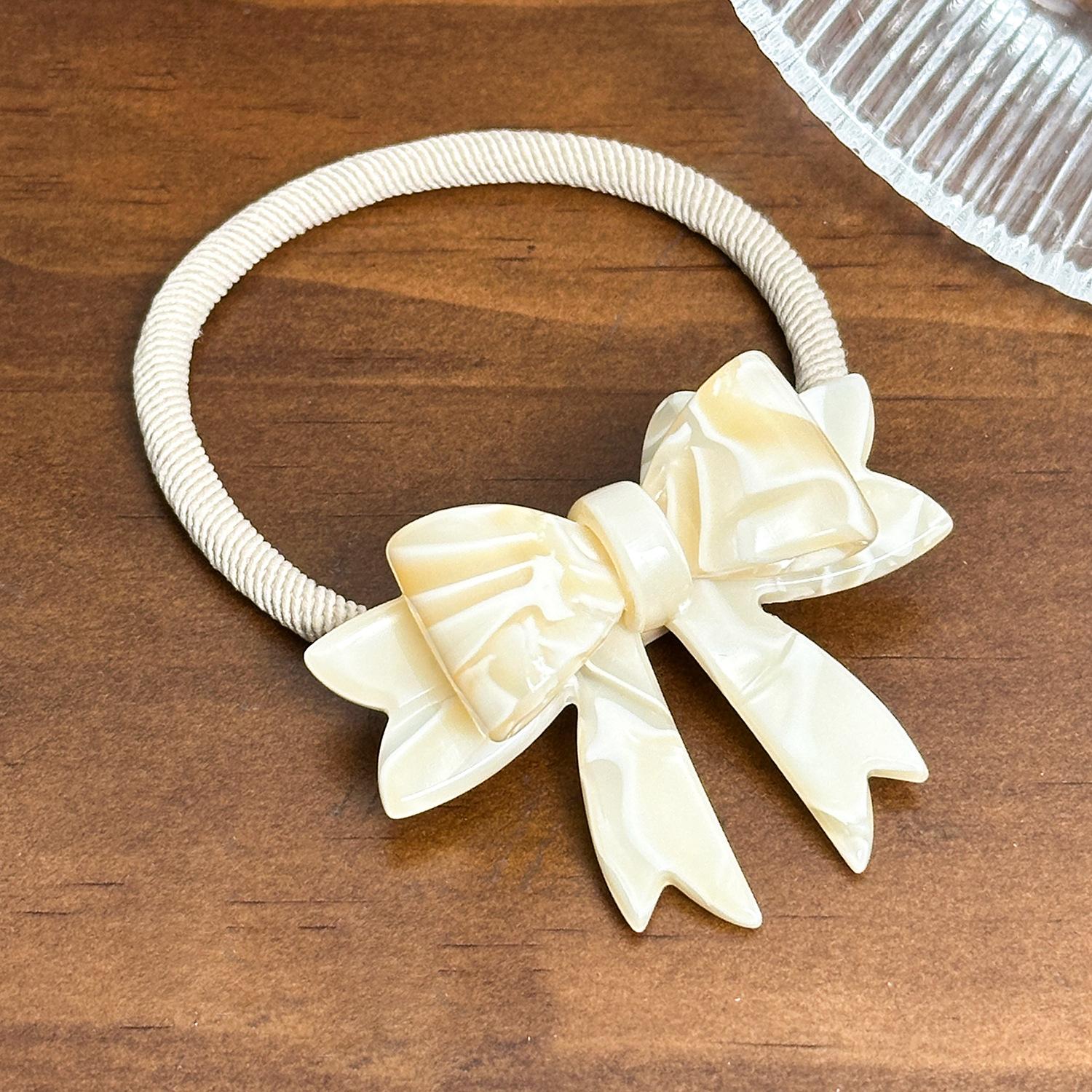 

Ацетатная изысканная заколка-бант, шикарный зажим-уточка и набор резинок для волос в розовом и коричневом цвете Beige Hair Tie