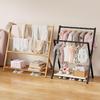 Compact Kids' Floor Clothes Rack: Foldable, Short, and Perfect for Bedrooms & Drying.