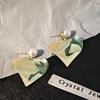 Silver Needle Minimalist Heart Dangle Earrings: Light Luxury Metal and Pearl Design for Women.