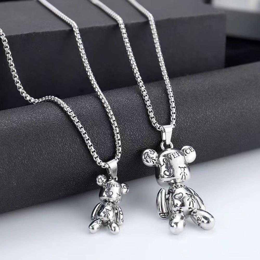 La marée dynamique des ours arrive ! Collier avec pendentif coulissant, chaîne de pull hip-hop punk pour couple, bijoux tendance pour femmes en gros