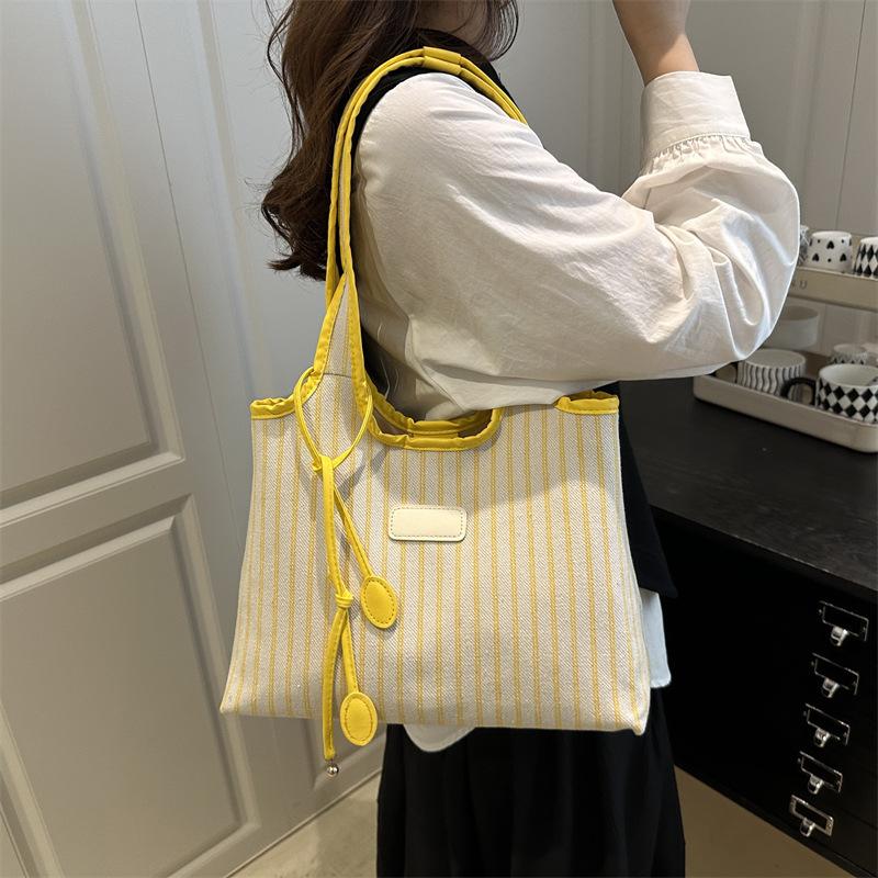 2025 New Niche Shoulder Bag Striped Simple Tote Bag Simple Versatile Portable Color Matching Armpit Bag