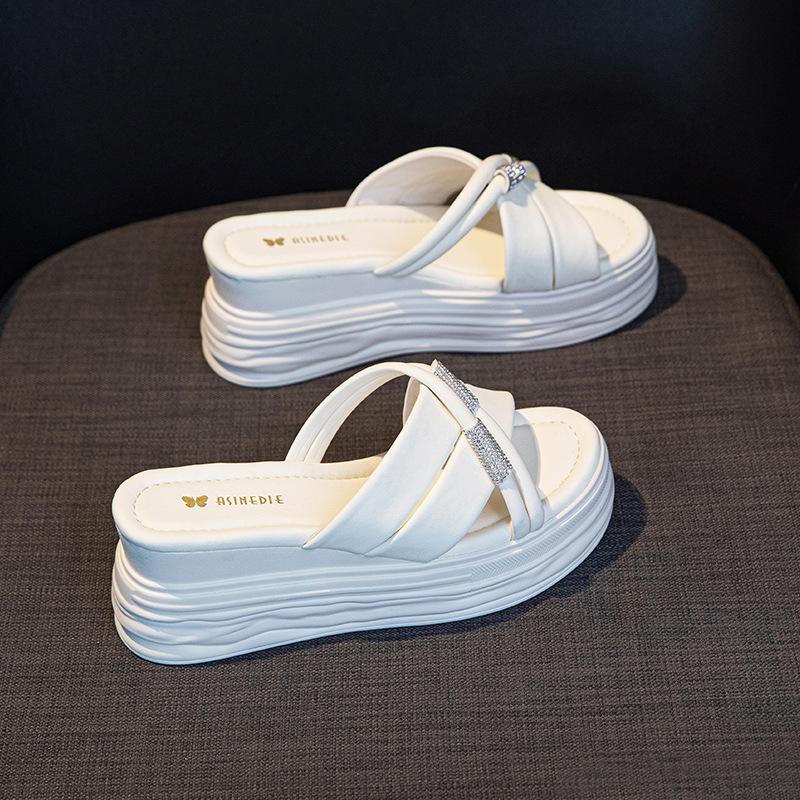 Thick-bottomed slope heel slippers women's high-end fashion 2025 summer new muffin versatile cool slippers increase height