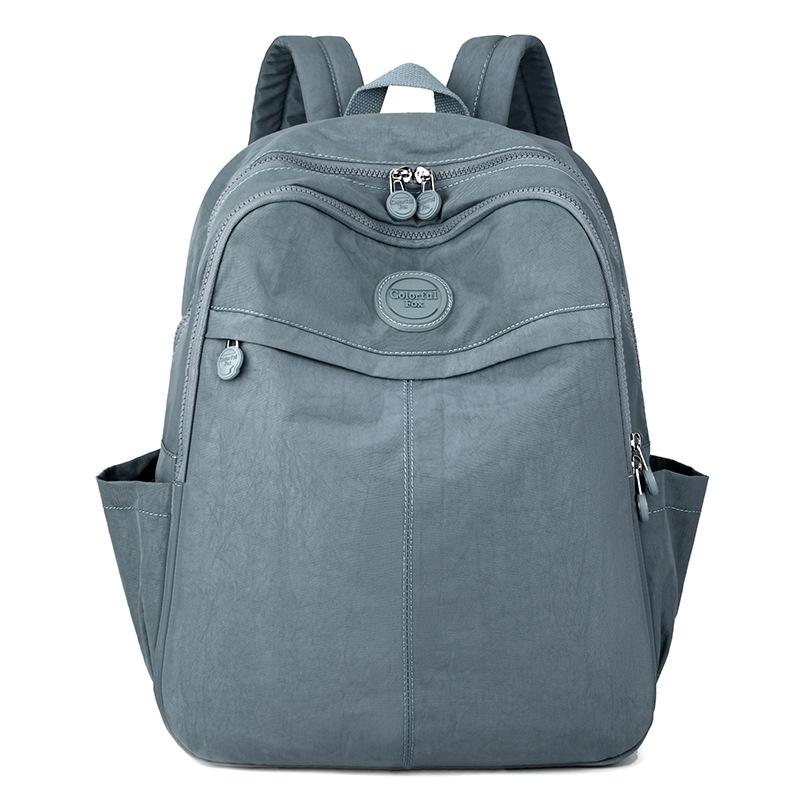 Nový velkokapacitní batoh Dámská korejská verze Batoh na počítač taška proti stříkající vodě