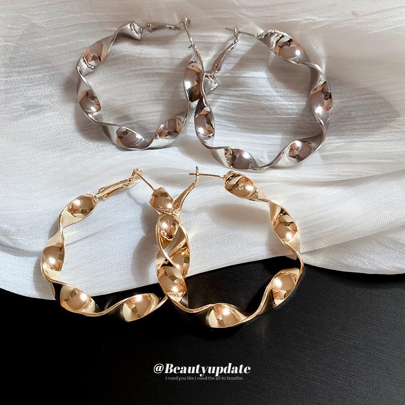 Silver needle exaggerated metal spiral round hoop earrings studs - high-end women's earrings