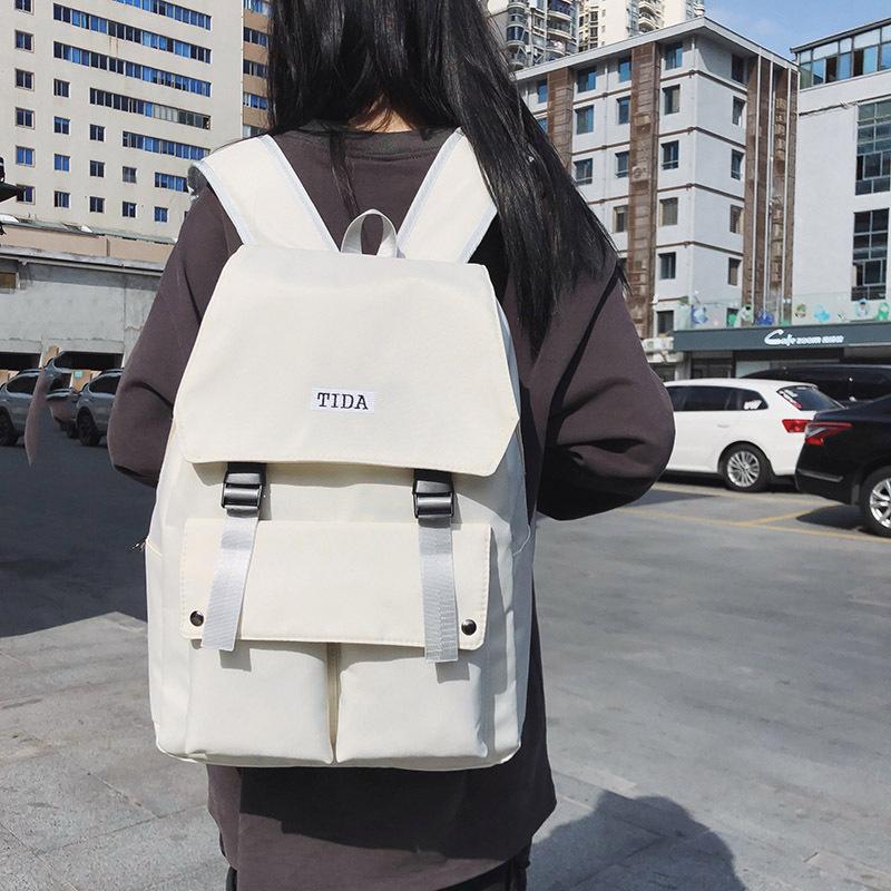 

Student schoolbag new large-capacity backpack male primary and secondary school student couple backpack білий